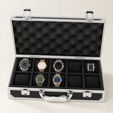 10-slot aluminum watch case with black panels, open with seven watches