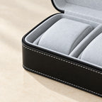 Close-up of the zipper, white stitching and light gray pillow of the watch box