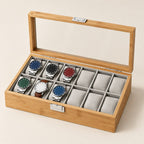 12-slot bamboo watch box with gray pillows, clear lid open