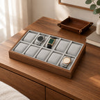 The 12 slot walnut grain watch storage box on a chest of drawers, for scale