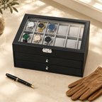 12-slot watch box closed, beside a fountain pen and leather gloves