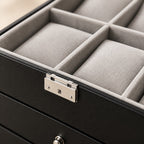 Close-up of the grey cushions and the silver-tone lock clasp
