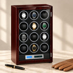 12-watch winder cabinet closed, beside a fountain pen and leather gloves