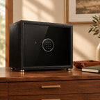 12-watch winder safe on a wooden chest of drawers beside a valet tray and a book