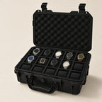 15-slot protective hard watch case, open with nine watches in foam compartments