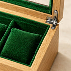 Close-up of the lining and front clasp of the 2-slot bamboo-grain watch box