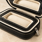 Close-up of the cream lining, padded cradle and zipper of the travel case