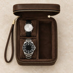 Top view of the open 2-watch and sunglasses leather travel case with watches of different sizes
