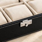 Close-up of the cream pillows and silver-tone clasp of the 20-slot watch box