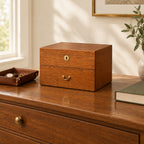 20-slot wooden watch box on a wooden chest of drawers