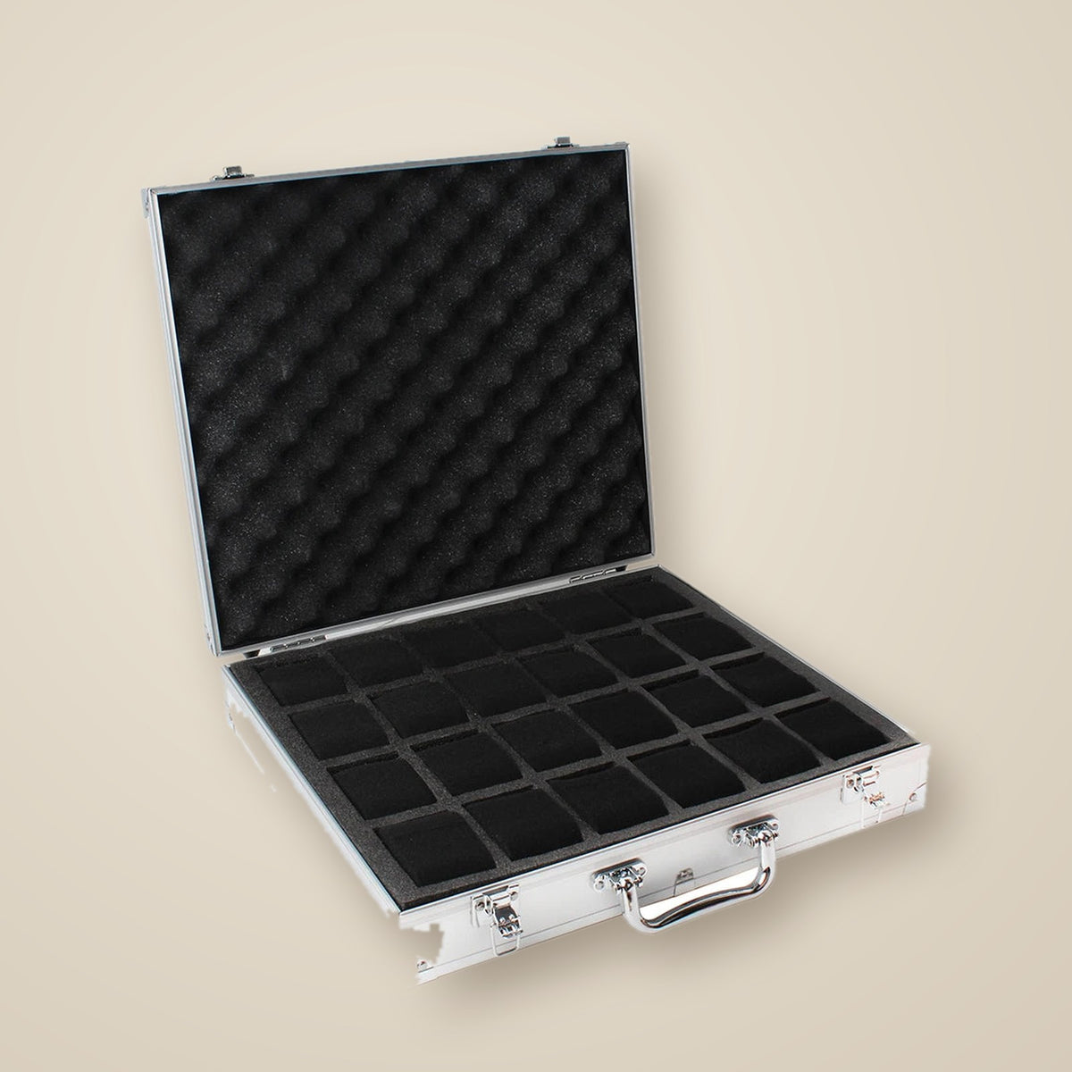 Top view of the 24-slot aluminum case with three watches of different sizes