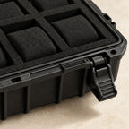 Close-up of the foam pillows and latch of the hard-shell watch case