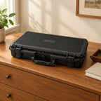 24-slot hard-shell watch case on a wooden chest of drawers