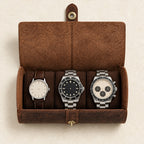 Top view of the open watch roll with three watches of different sizes