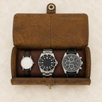 Top view of the open 3-slot crazy horse leather watch roll with watches of different sizes