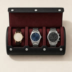 Top view of the open watch roll with three watches of different sizes