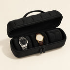 3-slot black hard-shell travel watch case open, two watches on sponge pillows