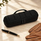 3-slot hard-shell watch case closed, beside a fountain pen and leather gloves