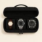 Top view of the 3-slot travel case holding three watches of different sizes