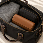 3-watch travel roll packed in an open travel bag