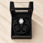 Top view of the open winder with three pillows and one watch