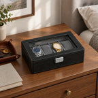 The 4 slot black watch box on a chest of drawers, for scale