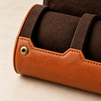 Close-up of the brass press studs and suede-look lining of the 4-slot watch roll