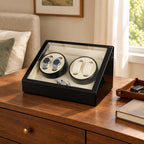 4-watch winder on a wooden chest of drawers