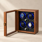 Walnut 4-watch winder cabinet, glass door open, blue-lit rotors