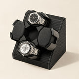 4-watch winder in black woven faux leather with two watches on its turntable