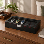 The 5 slot carbon pattern watch box on a chest of drawers, for scale