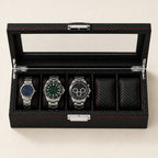 Top view of the 5 slot carbon pattern watch box with a 36 mm, a 42 mm and a 45 mm watch