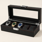 5-slot carbon-pattern watch box with red stitching, lid open
