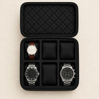 Top view of the 6-slot black hard-shell travel watch case with watches of different sizes