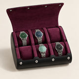 6-slot watch travel case open with plum interior and three watches