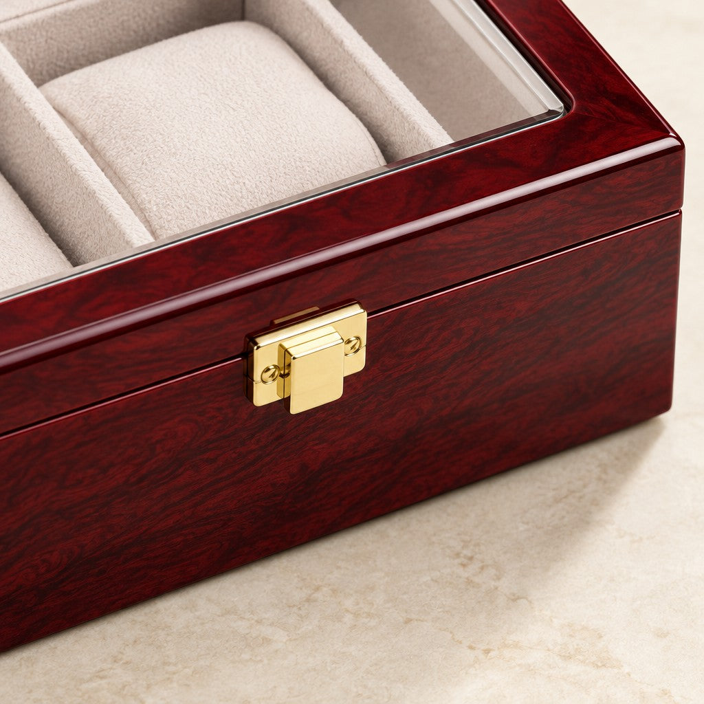 Close-up of the gold-tone clasp and lacquered wood of the 6-slot watch box