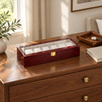 6-slot wooden watch box on a chest of drawers, for scale