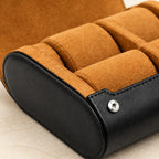 Close-up of the lining and hardware of the 6-watch black roll travel case