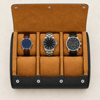 Top view of the 6-watch black roll travel case with watches of different sizes