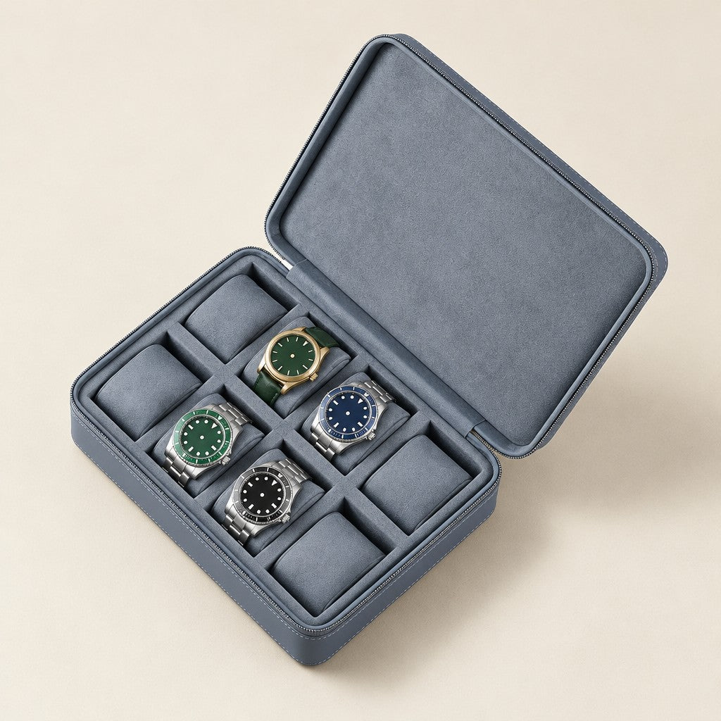 8-slot zippered leather watch box in gray, open with four watches