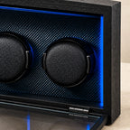 Close-up of two textured watch pillows and the glass front hinge