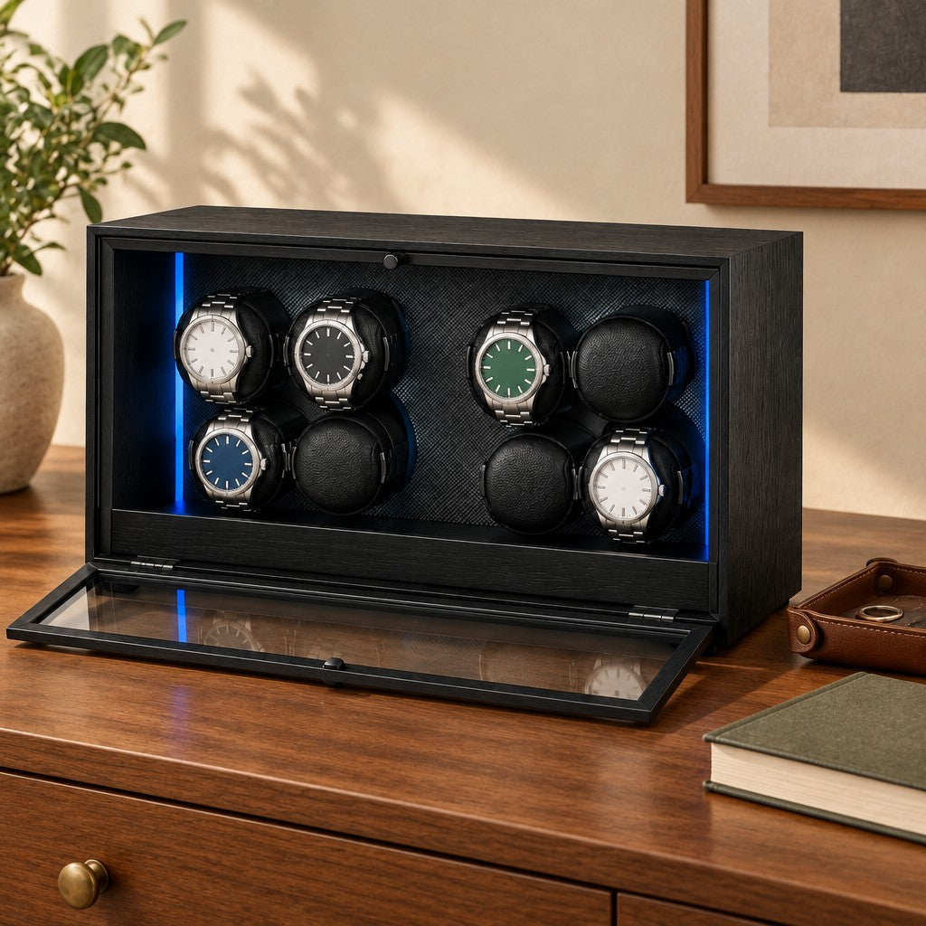 8-watch winder cabinet on a wooden chest of drawers beside a valet tray and a book