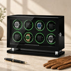 8-watch winder cabinet beside a fountain pen and leather gloves