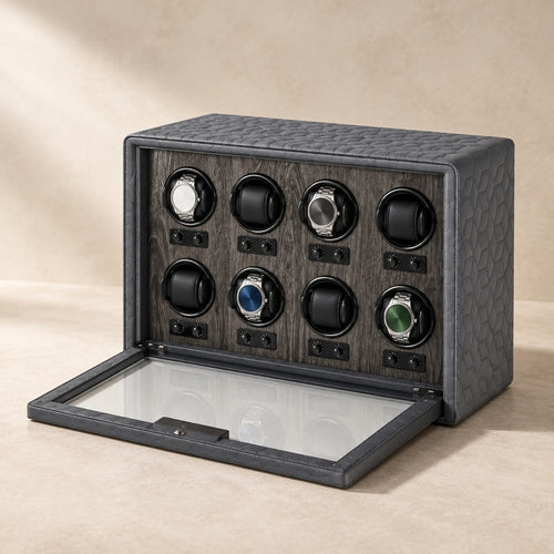 Grey textured-leather 8-watch winder case with the glass front lowered and four watches