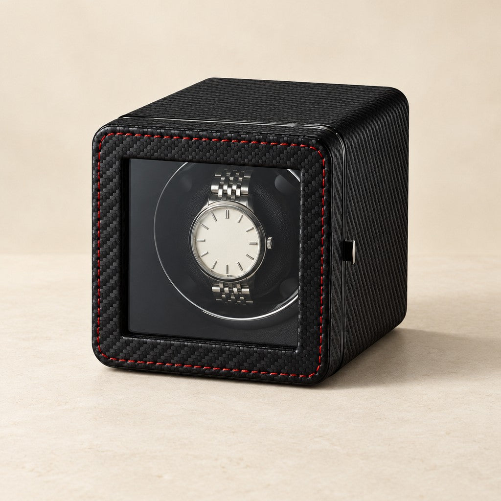 Black carbon-fiber compact single watch winder with a watch behind its window
