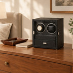Double watch winder with jewelry drawer on a wooden chest of drawers