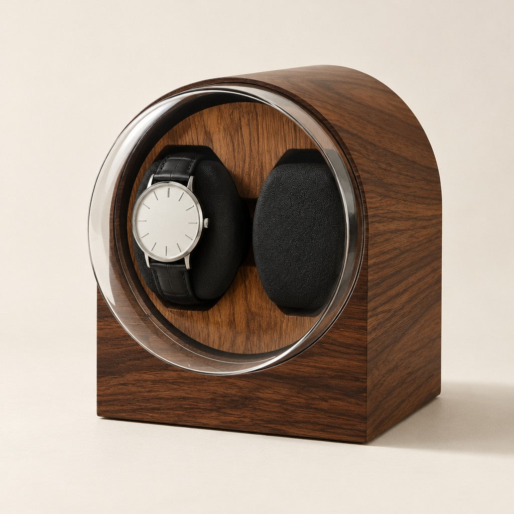 Double watch winder in dark wood grain with one watch on its pillow