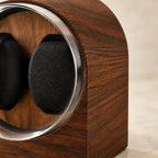 Close-up of the wood grain, acrylic dome edge and soft pillow of the winder