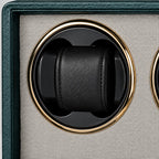 Close-up of a padded pillow and the gold-tone rotor ring