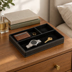 Faux leather desk valet tray with 4 compartments, on a chest of drawers, for scale